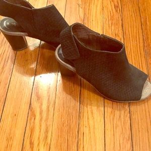 Peep-toe strappy heel with unique detail!